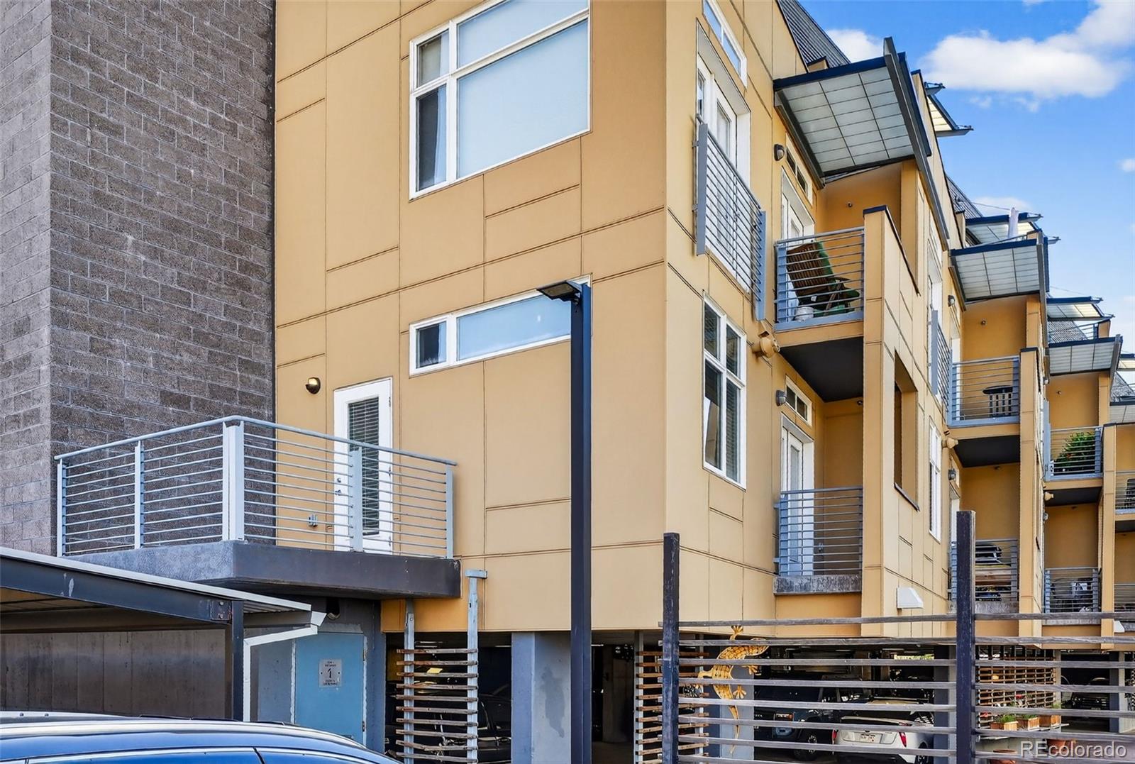 3101 Blake Street, Unit 209 Denver, CO 80205 - Photo 2 of 33 a front view of a multi story building