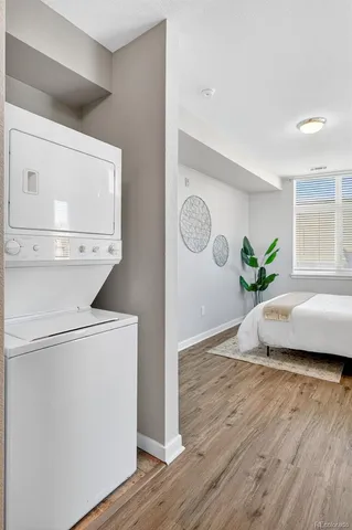 a hallway with a washer and dryer