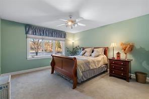 335 Red Oak Court, Unit 335 Monroeville, PA 15146 - Photo 18 of 50 a spacious bedroom with a bed and a window