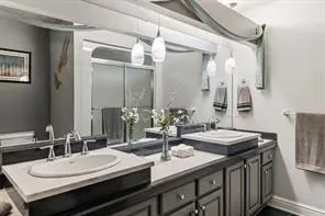 a dining room with a table and chairs