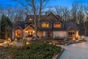 335 Red Oak Court, Unit 335 Monroeville, PA 15146 - Photo 2 of 50 a front view of a house with a yard