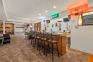 335 Red Oak Court, Unit 335 Monroeville, PA 15146 - Photo 25 of 50 a room with lots of chairs and white walls