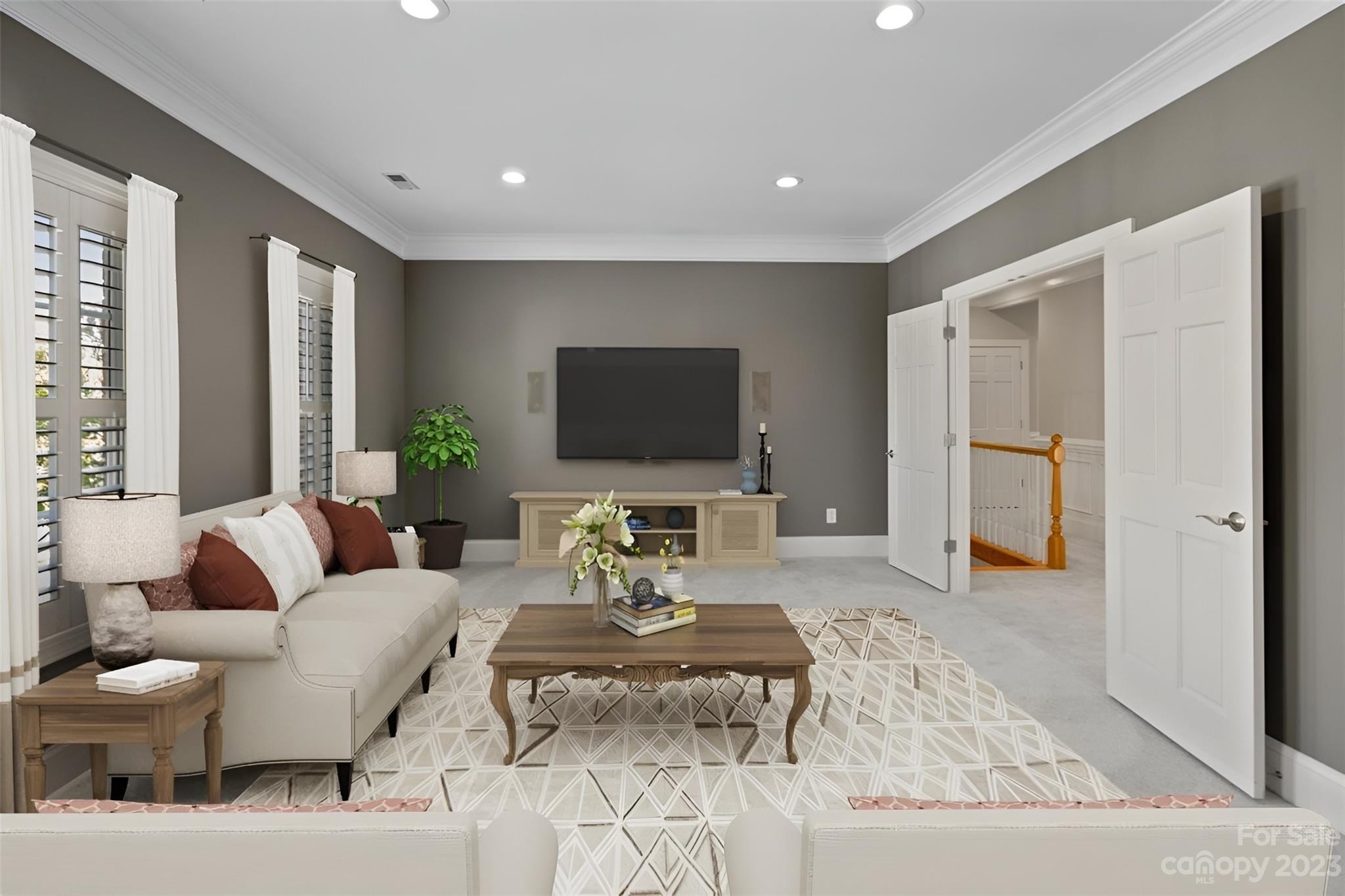 4409 Mickleton Road Charlotte, NC 28226 - Photo 11 of 31 a living room with furniture and a flat screen tv