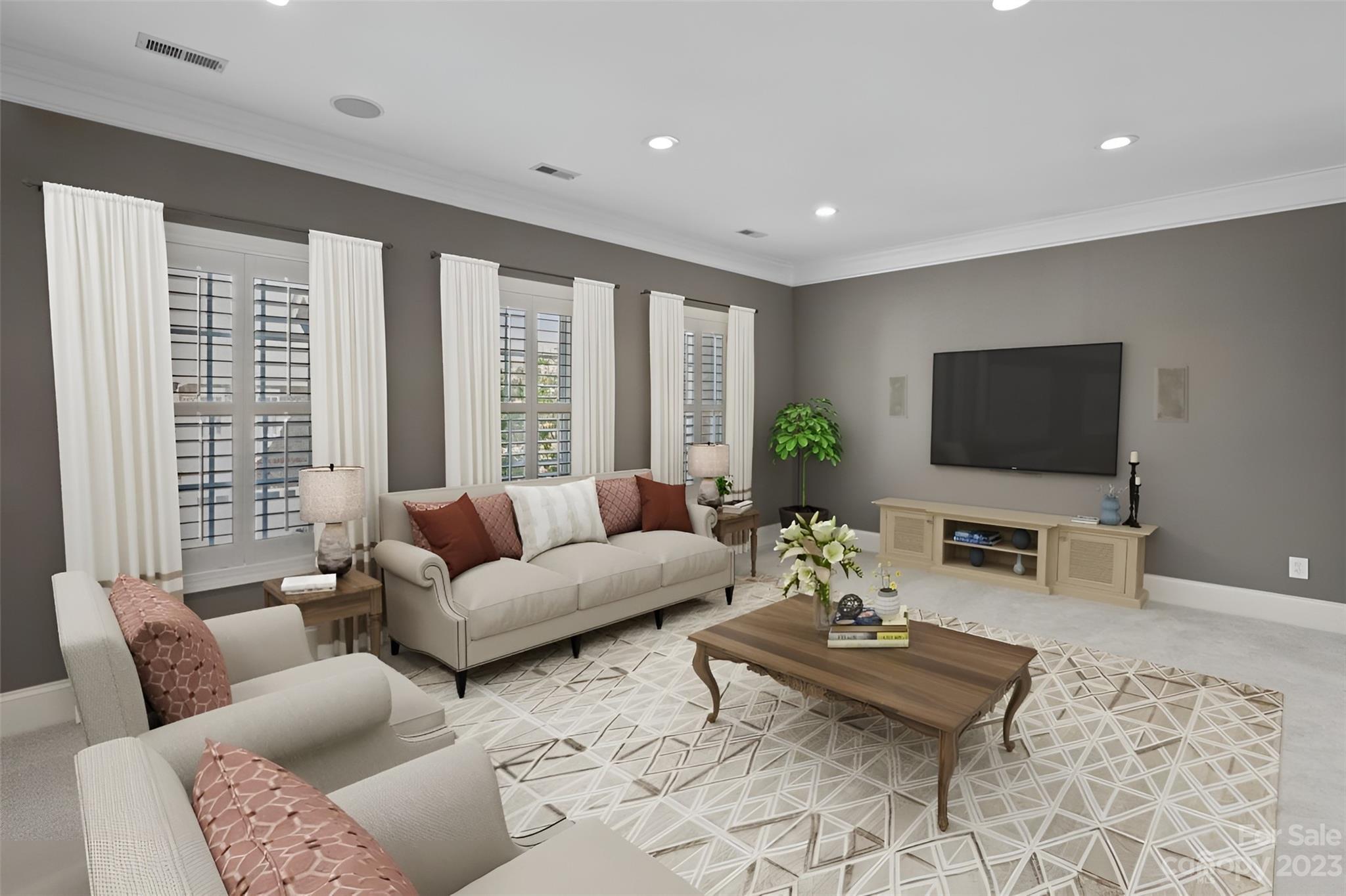 4409 Mickleton Road Charlotte, NC 28226 - Photo 12 of 31 a living room with furniture and a flat screen tv