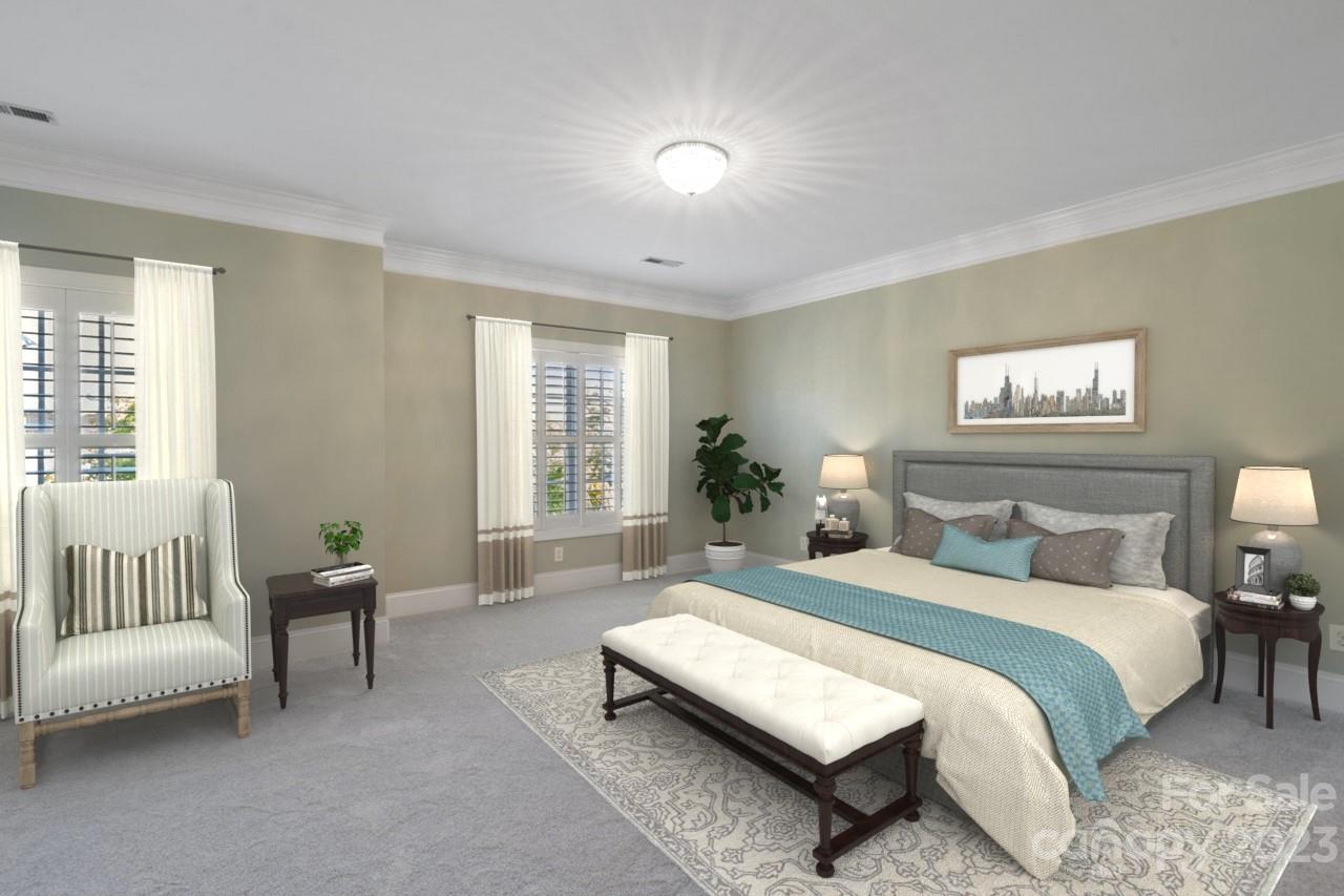 4409 Mickleton Road Charlotte, NC 28226 - Photo 13 of 31 a spacious bedroom with a bed and a couch