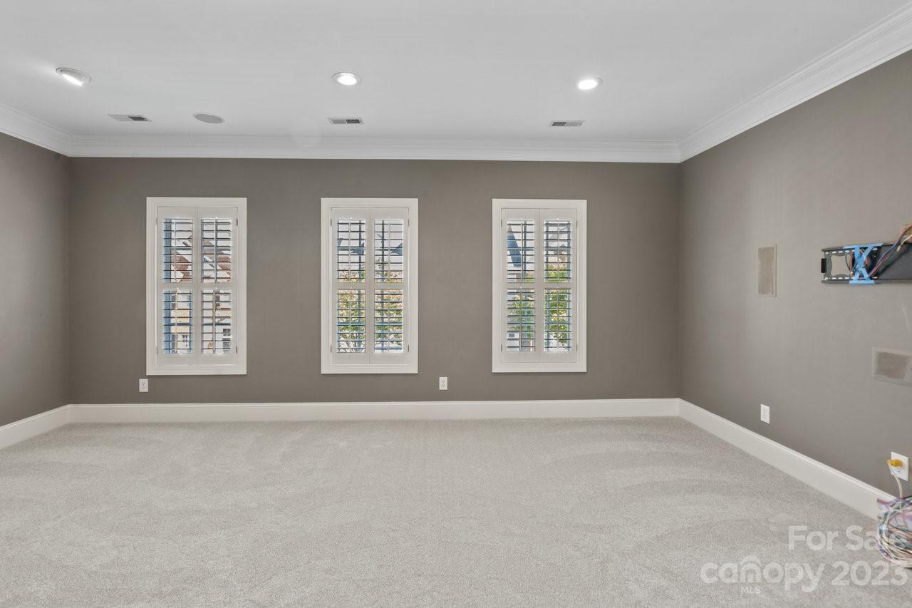 4409 Mickleton Road Charlotte, NC 28226 - Photo 17 of 31 a view of an empty room with a window