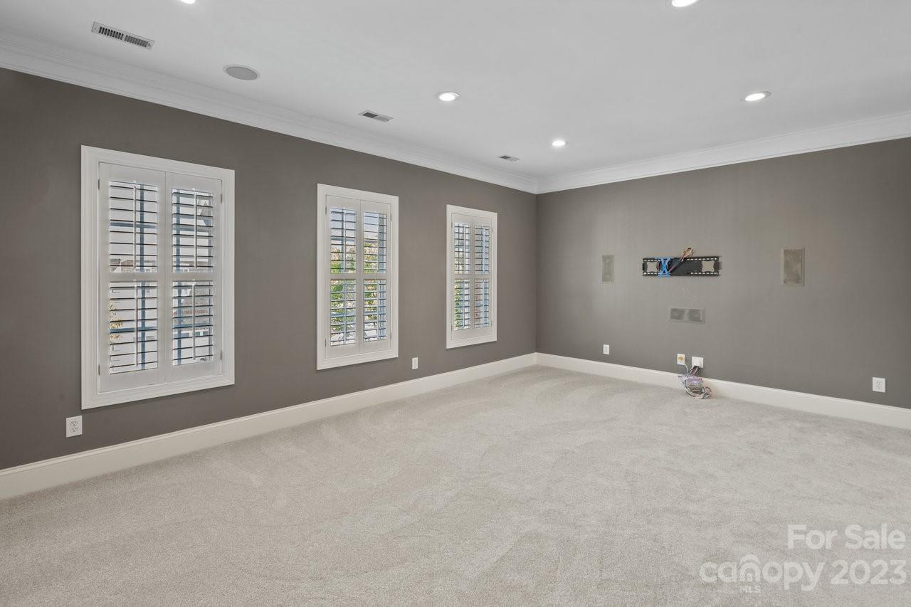 4409 Mickleton Road Charlotte, NC 28226 - Photo 19 of 31 a view of an empty room with a window