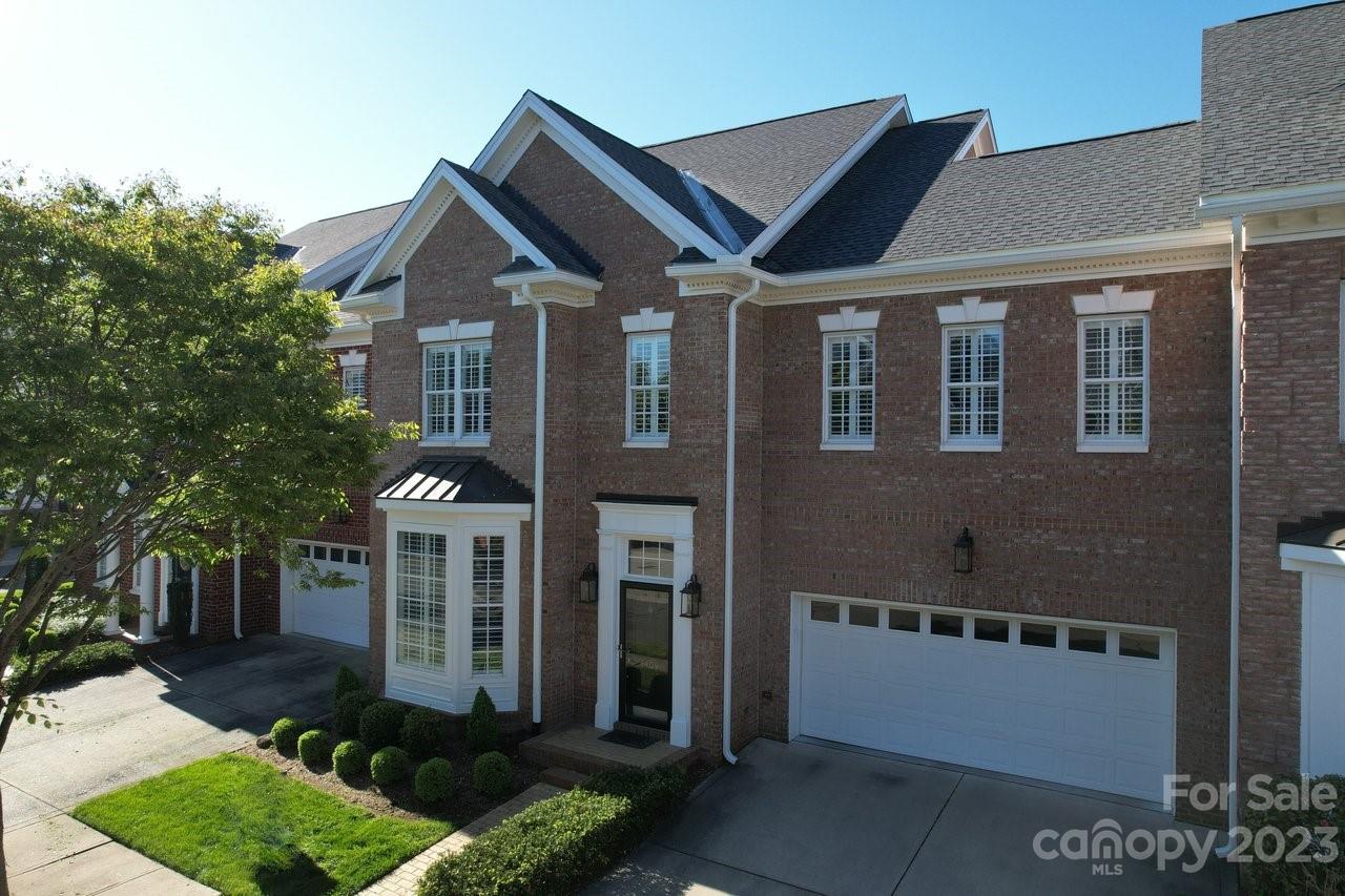 4409 Mickleton Road Charlotte, NC 28226 - Photo 2 of 31 a front view of a house with a yard