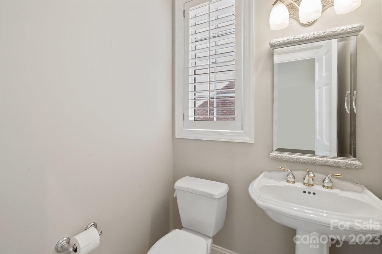 4409 Mickleton Road Charlotte, NC 28226 - Photo 24 of 31 a bathroom with a sink and a toilet
