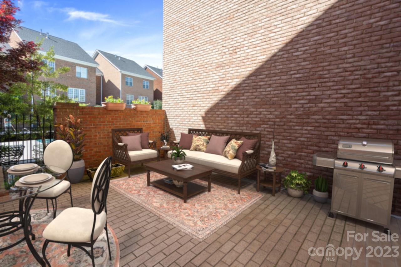 4409 Mickleton Road Charlotte, NC 28226 - Photo 27 of 31 a backyard of a house with barbeque oven table and chairs