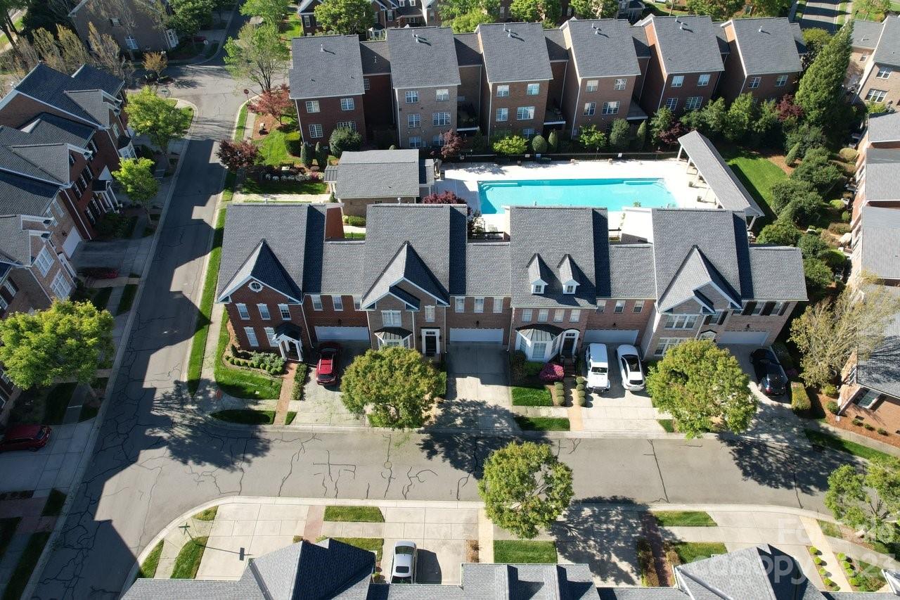 4409 Mickleton Road Charlotte, NC 28226 - Photo 30 of 31 an aerial view of a house with a swimming pool