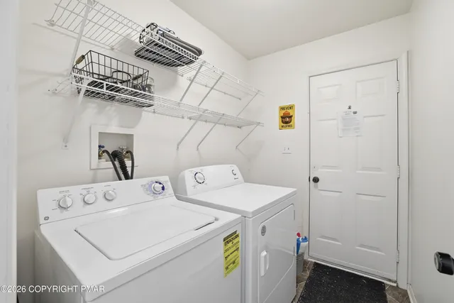 a bedroom with furniture and a couch