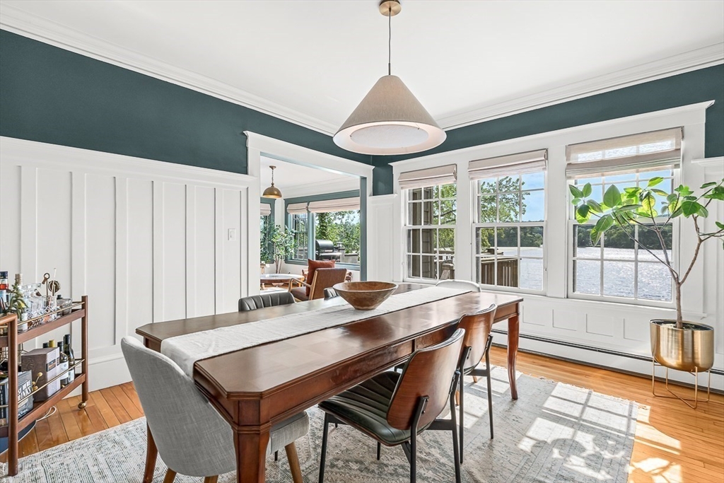 9 Lakeview Terrace Winchester, MA 01890 - Photo 14 of 42 a dining room with furniture a chandelier and wooden floor