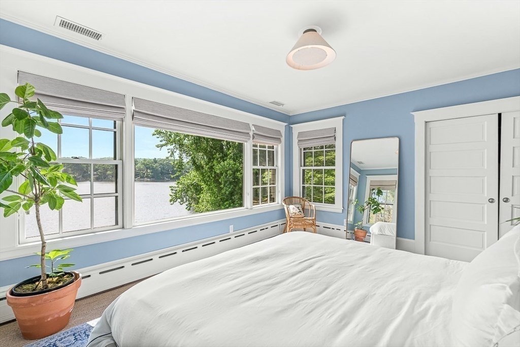 9 Lakeview Terrace Winchester, MA 01890 - Photo 22 of 42 a bedroom with a bed and a large window