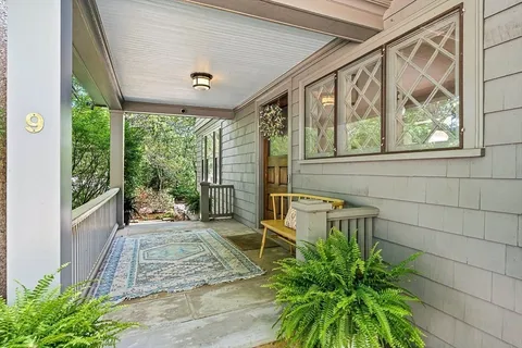 a porch with seating space