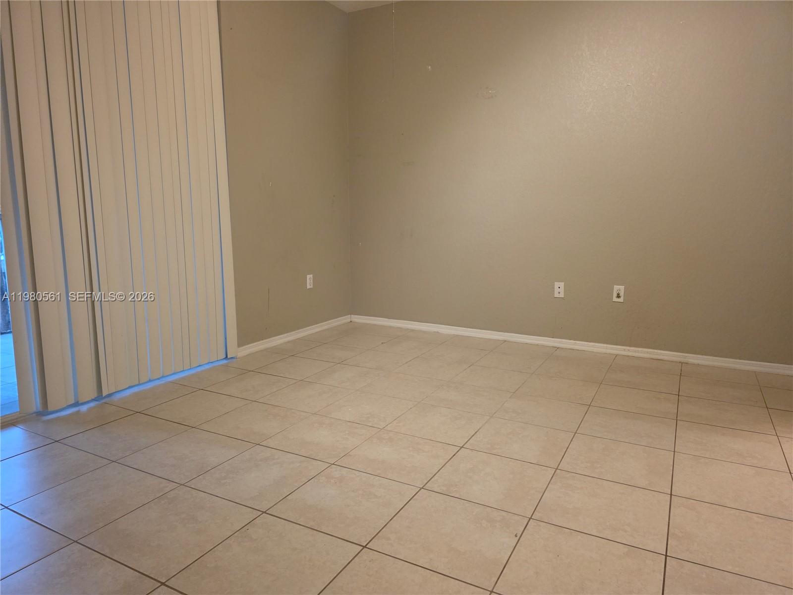 6660 West Sample Road, Unit 6660 Coral Springs, FL 33067 - Photo 11 of 30 a view of an empty room