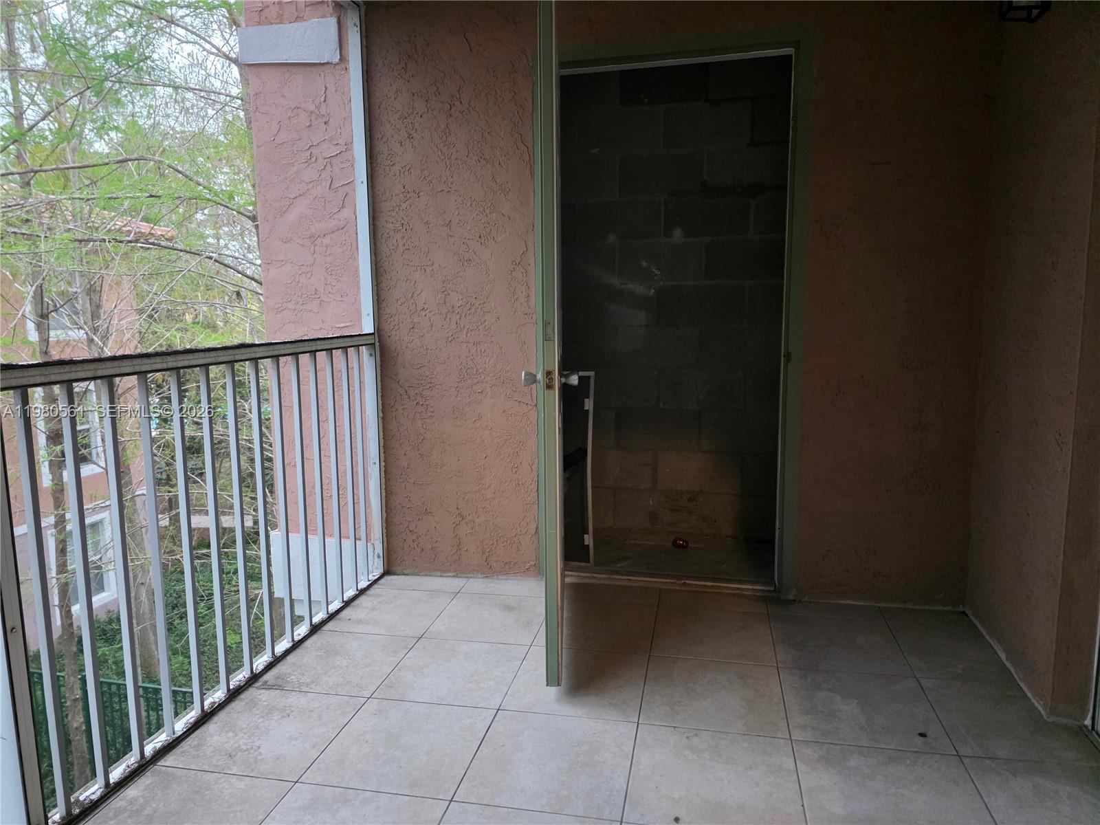 6660 West Sample Road, Unit 6660 Coral Springs, FL 33067 - Photo 23 of 30 a view of a balcony