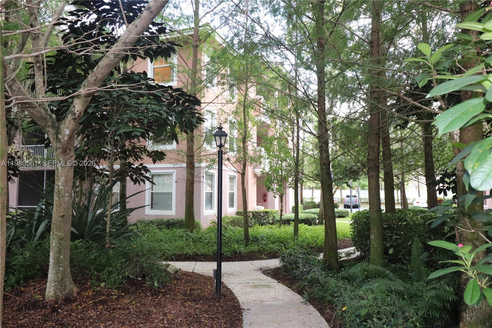 6660 West Sample Road, Unit 6660 Coral Springs, FL 33067 - Photo 29 of 30 a view of a park with tree s