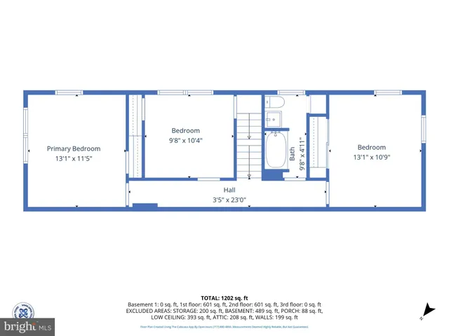 a picture of floor with a white wall and a large window