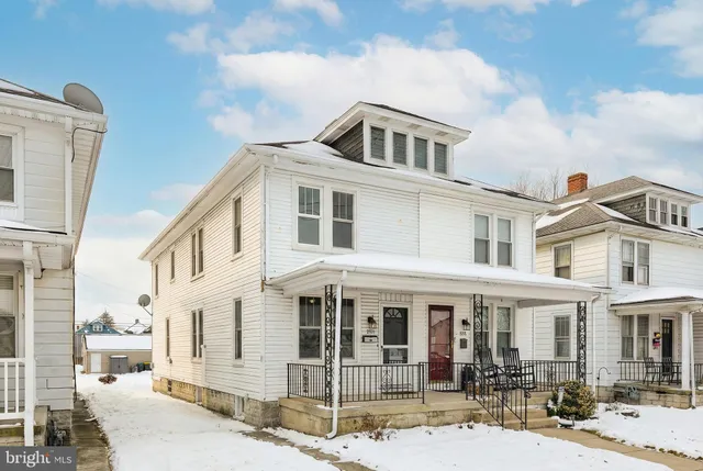a view of pool with outdoor seating