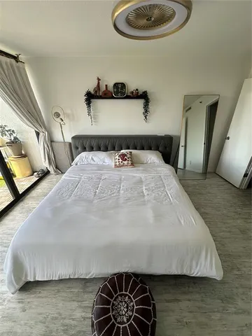 a bathroom with a sink a vanity and a mirror