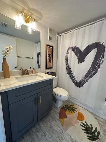 a view of a balcony with two chairs