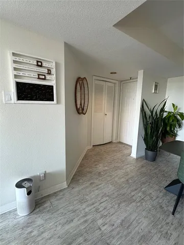 a view of a hallway with entryway