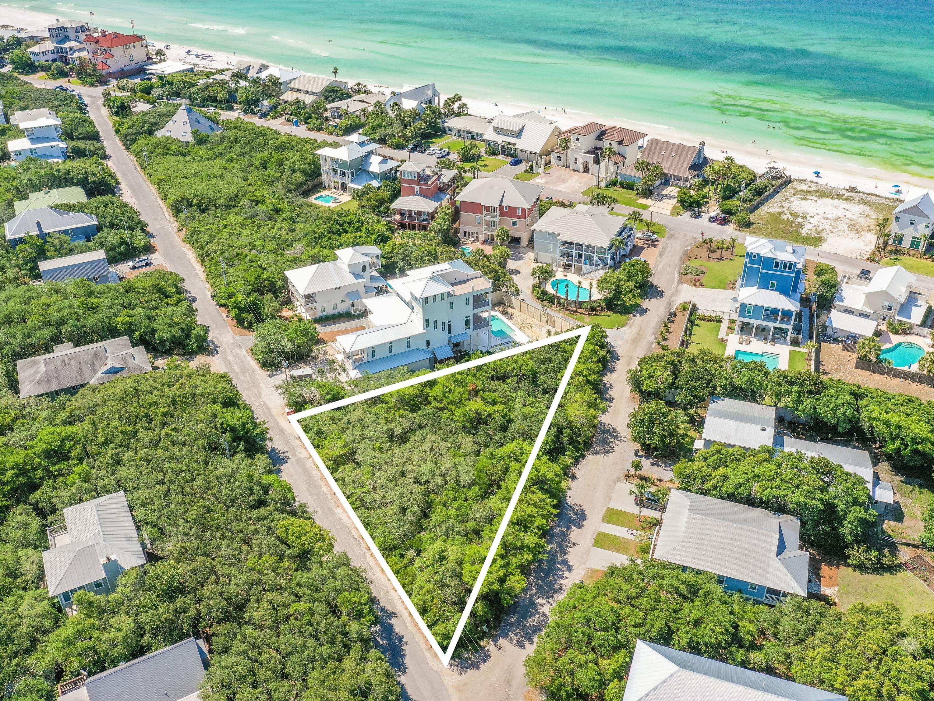 230 Blue Lake Road Santa Rosa Beach, FL 32459 - Photo 12 of 14 an aerial view of a residential houses with outdoor space and street view