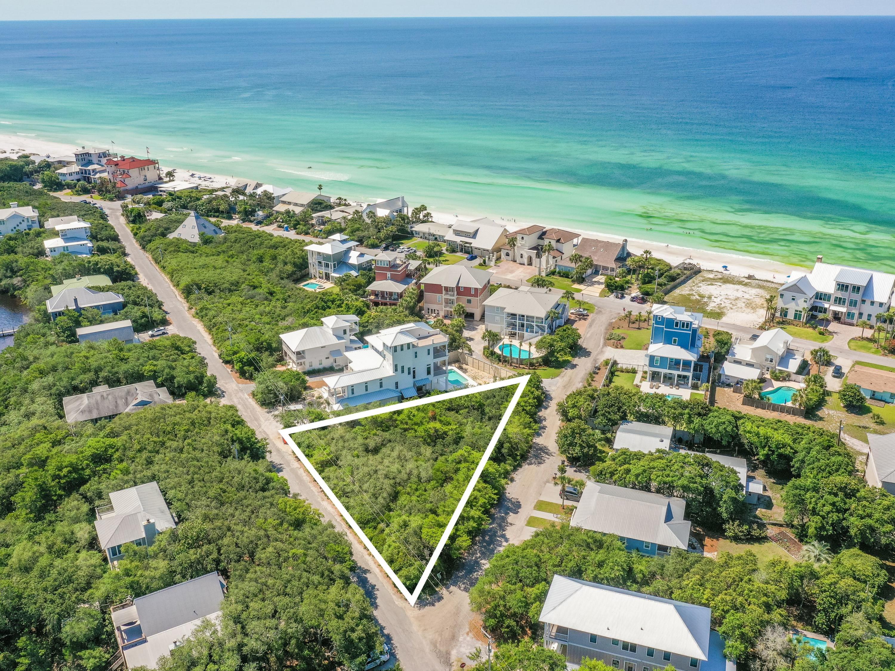 230 Blue Lake Road Santa Rosa Beach, FL 32459 - Photo 14 of 14 an aerial view of residential houses with outdoor space and trees