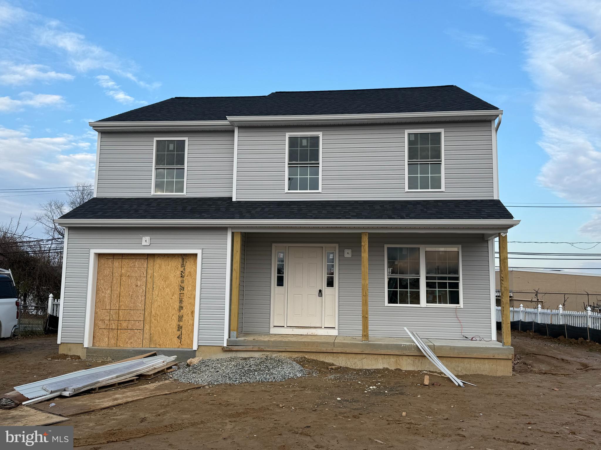 a front view of a house with a garage