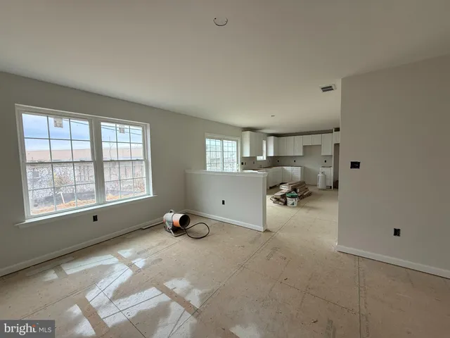 a room with furniture and a window