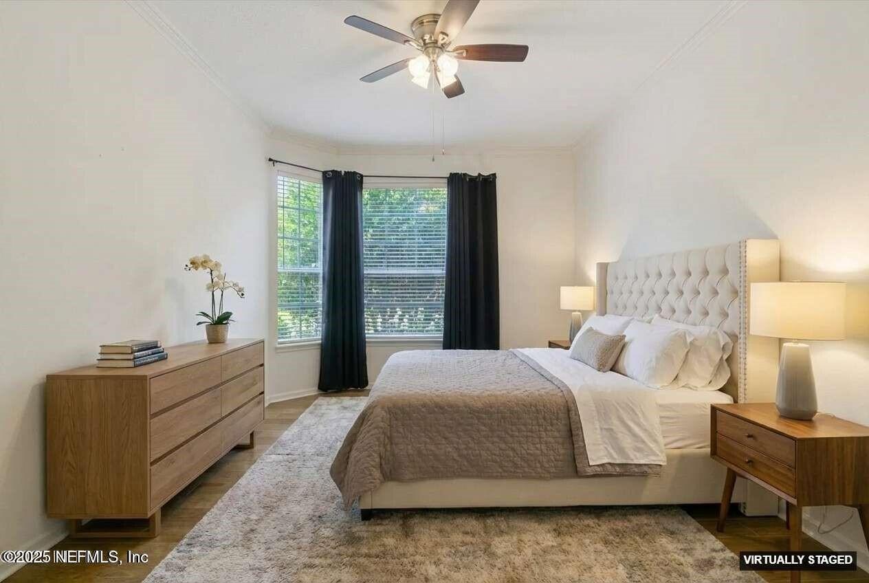 7990 Baymeadows Road East, Unit 201 Jacksonville, FL 32256 - Photo 21 of 43 a bedroom with a bed and window