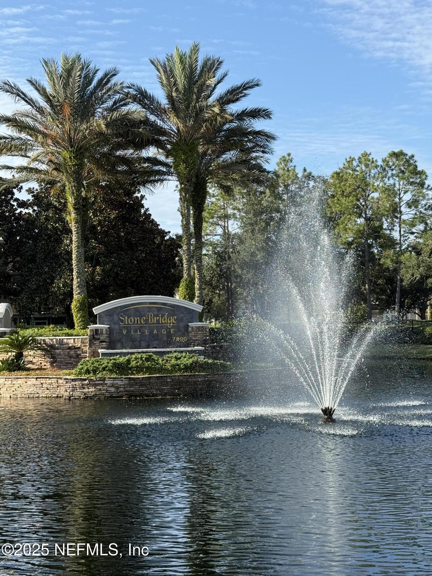 7990 Baymeadows Road East, Unit 201 Jacksonville, FL 32256 - Photo 41 of 43 a view of a lake with a house