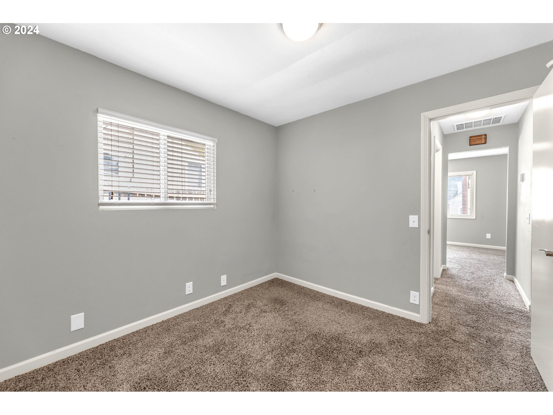 825 Northwest Greeley Street Camas, WA 98607 - Photo 19 of 27 a view of an empty room with a window