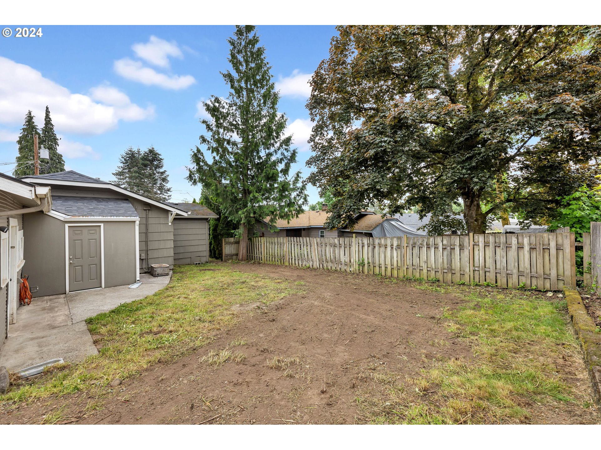 825 Northwest Greeley Street Camas, WA 98607 - Photo 23 of 27 a view of a backyard with a cabin