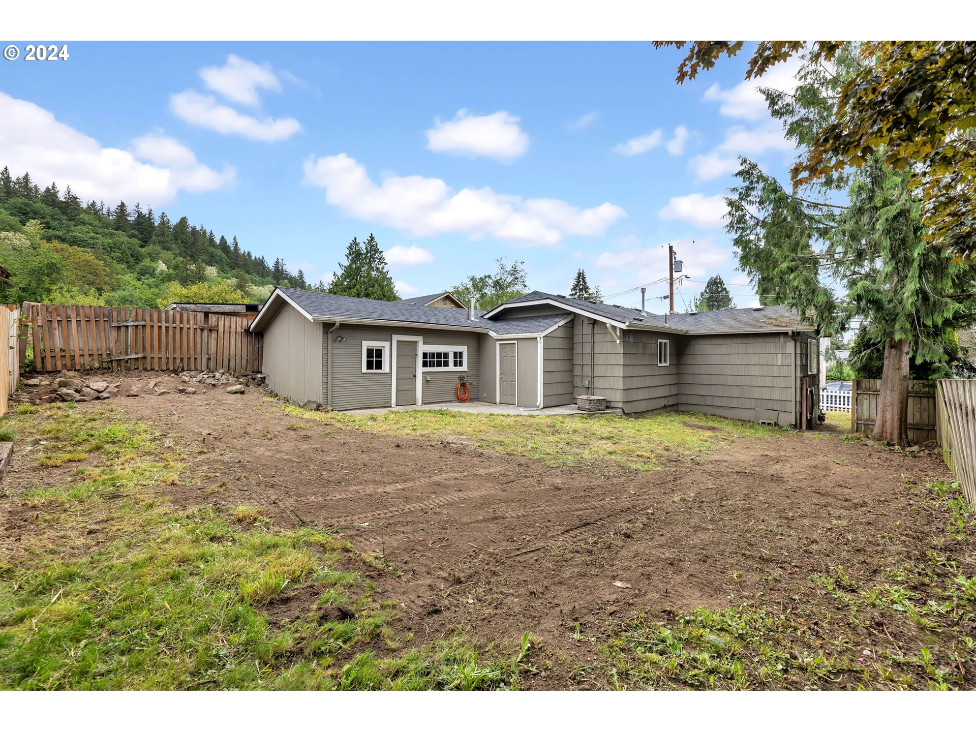 825 Northwest Greeley Street Camas, WA 98607 - Photo 24 of 27 a view of a house with a backyard