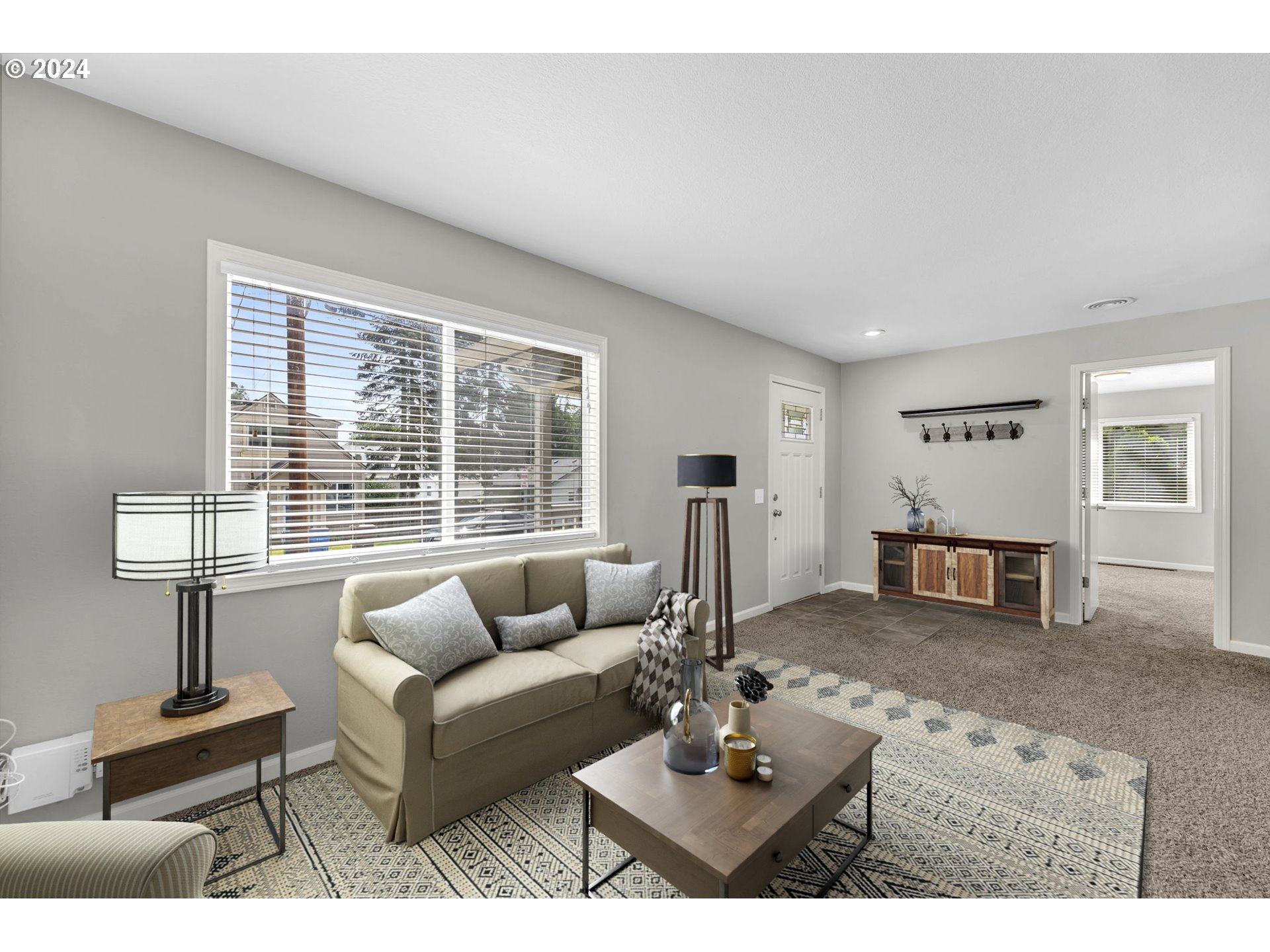 825 Northwest Greeley Street Camas, WA 98607 - Photo 7 of 27 a living room with furniture and floor to ceiling window