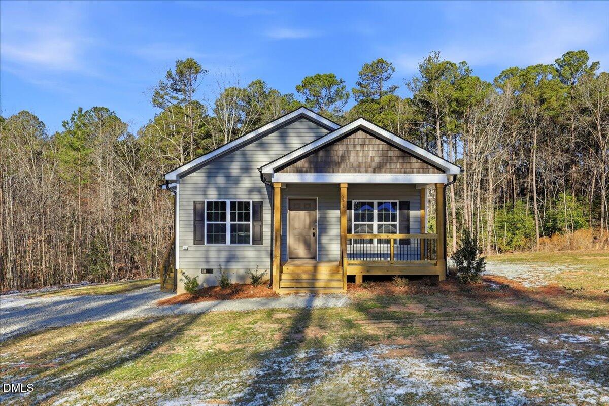 358 Natchez Trace Fuquay-Varina, NC 27526 - Photo 1 of 26 a front view of a house with garden
