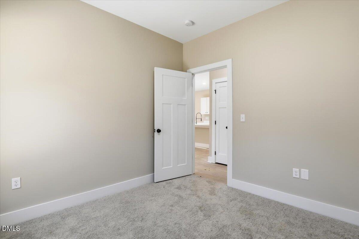358 Natchez Trace Fuquay-Varina, NC 27526 - Photo 12 of 26 an empty room with closet area