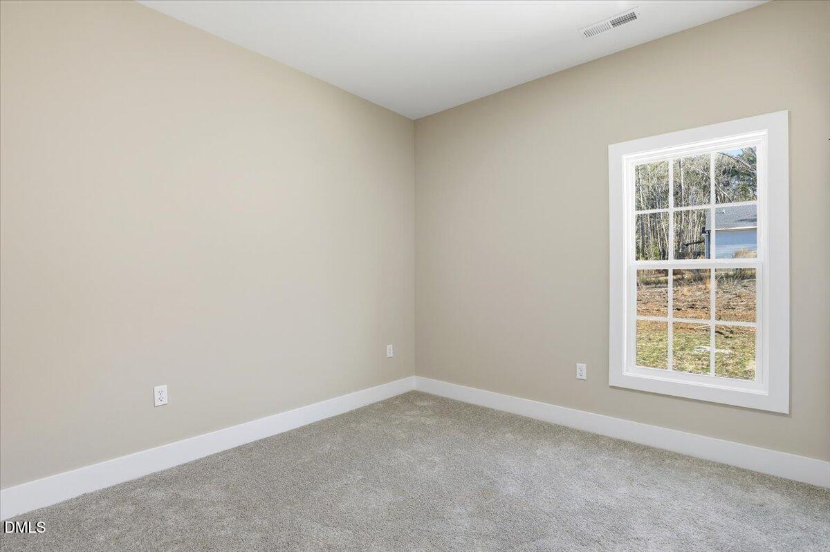 358 Natchez Trace Fuquay-Varina, NC 27526 - Photo 13 of 26 an empty room with a window