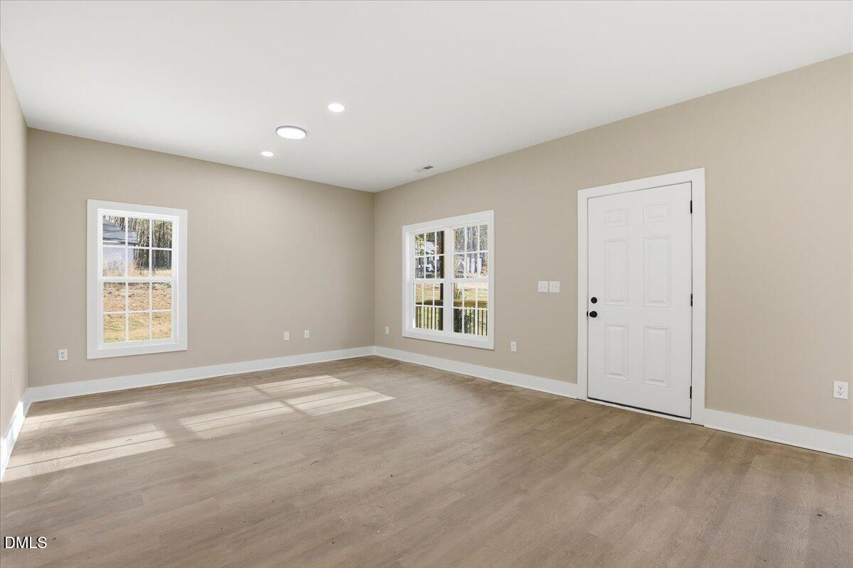 358 Natchez Trace Fuquay-Varina, NC 27526 - Photo 20 of 26 a view of an empty room with a window
