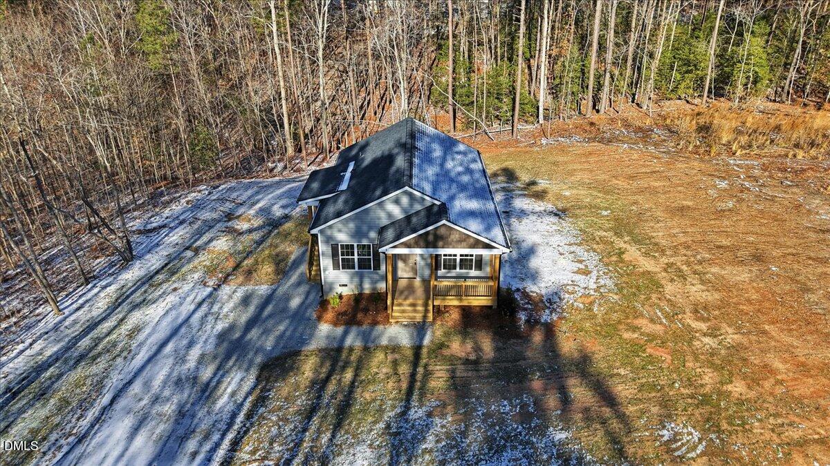 358 Natchez Trace Fuquay-Varina, NC 27526 - Photo 24 of 26 a view of a house with a yard