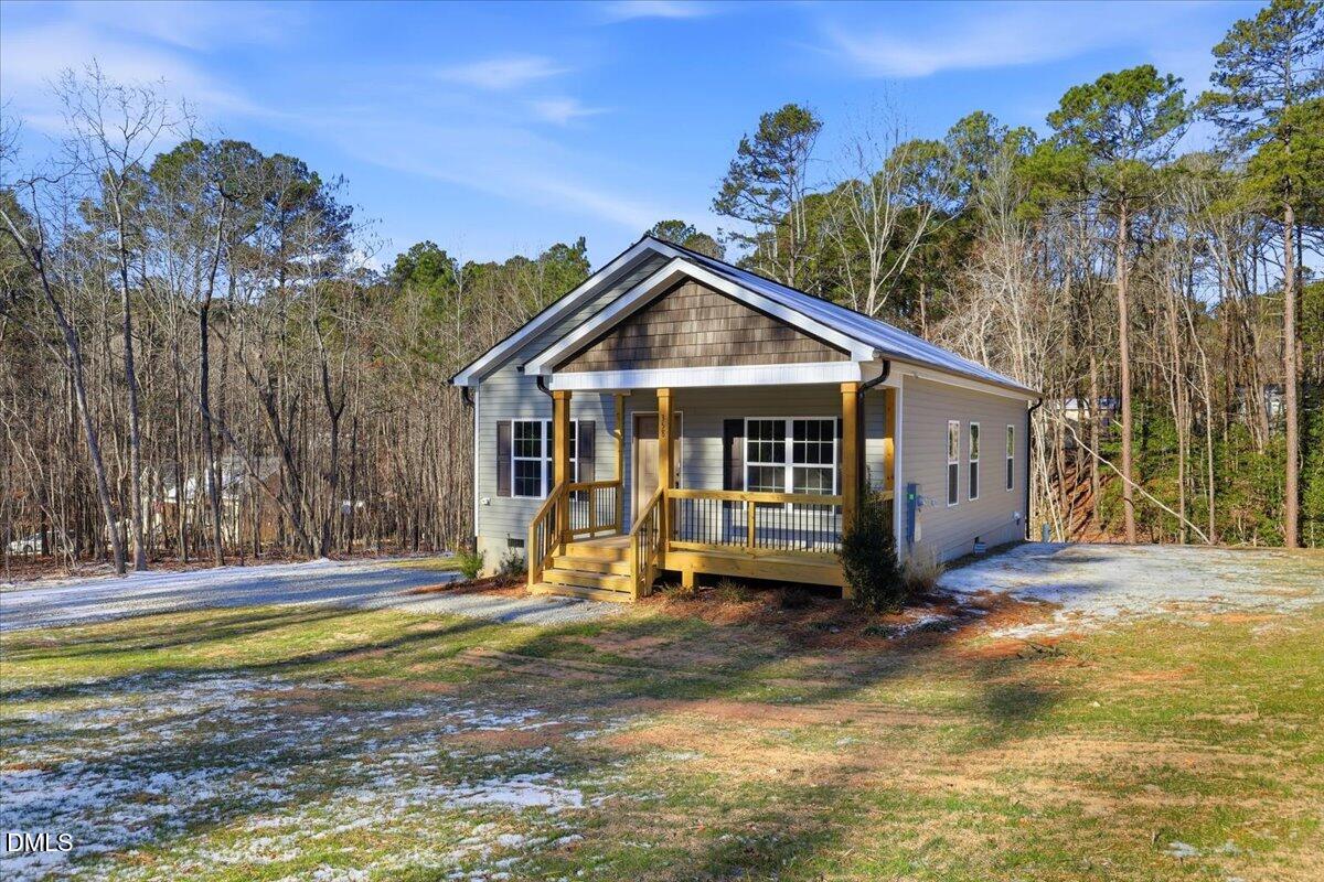 358 Natchez Trace Fuquay-Varina, NC 27526 - Photo 26 of 26 a view of a house with backyard and sitting area