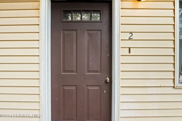 a view of a living room and dining room