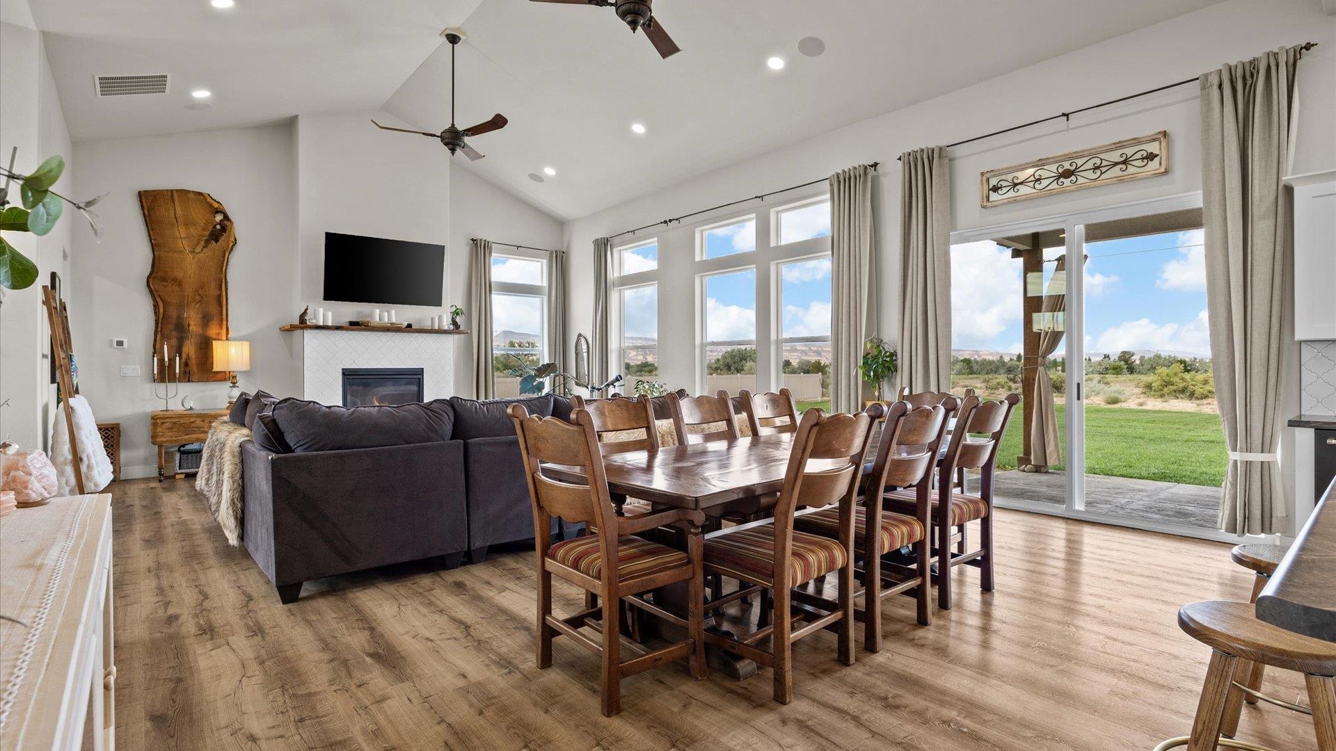 1730 Stremel Creek Fruita, CO 81521 - Photo 15 of 42 a view of a dining room with furniture window and wooden floor