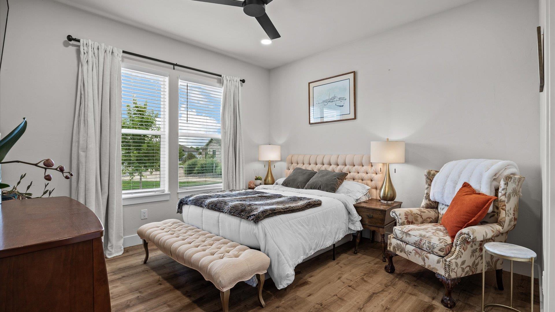 1730 Stremel Creek Fruita, CO 81521 - Photo 22 of 42 a bedroom with a bed and wooden floor