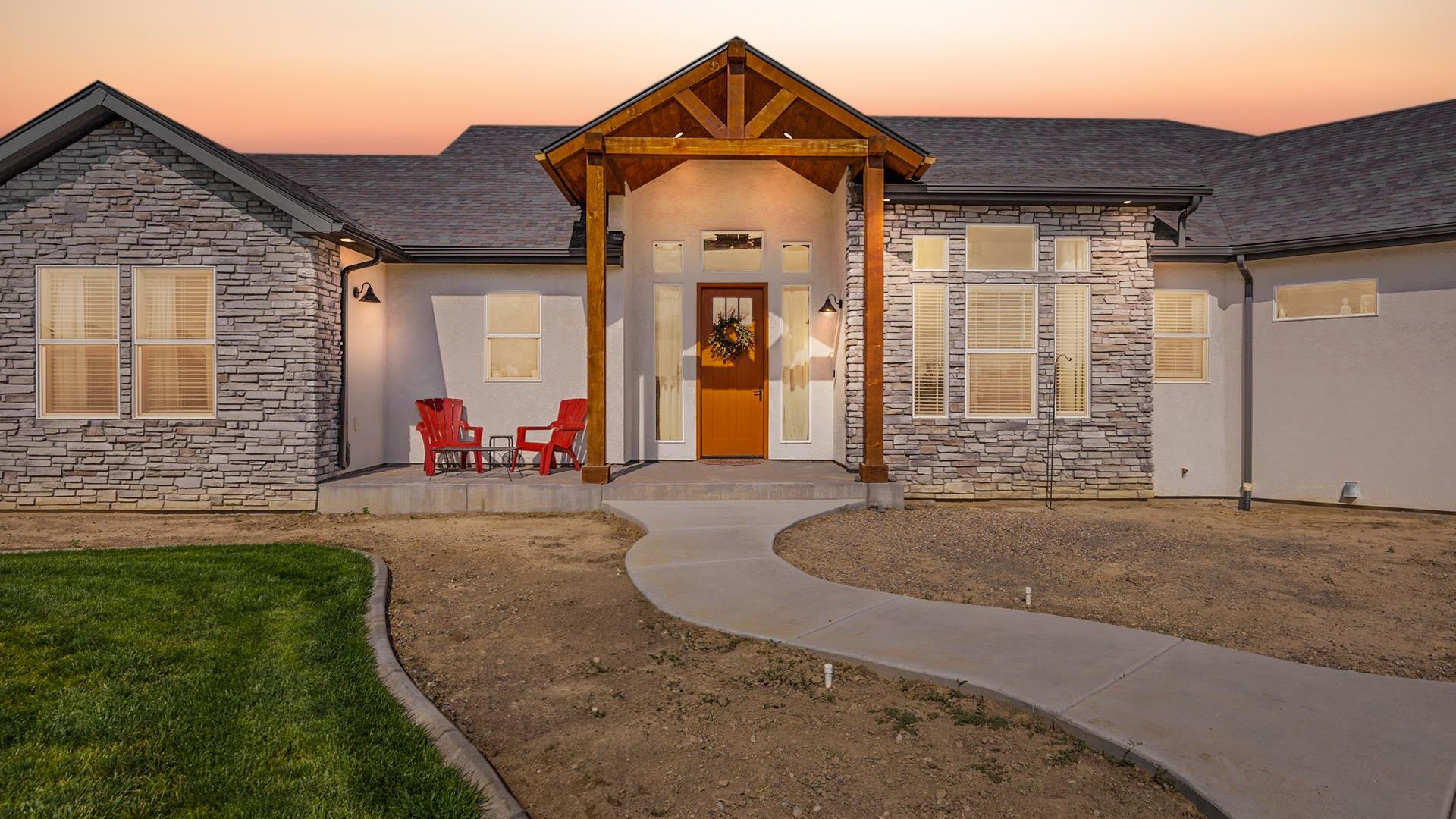 1730 Stremel Creek Fruita, CO 81521 - Photo 3 of 42 a view of a house with outdoor space