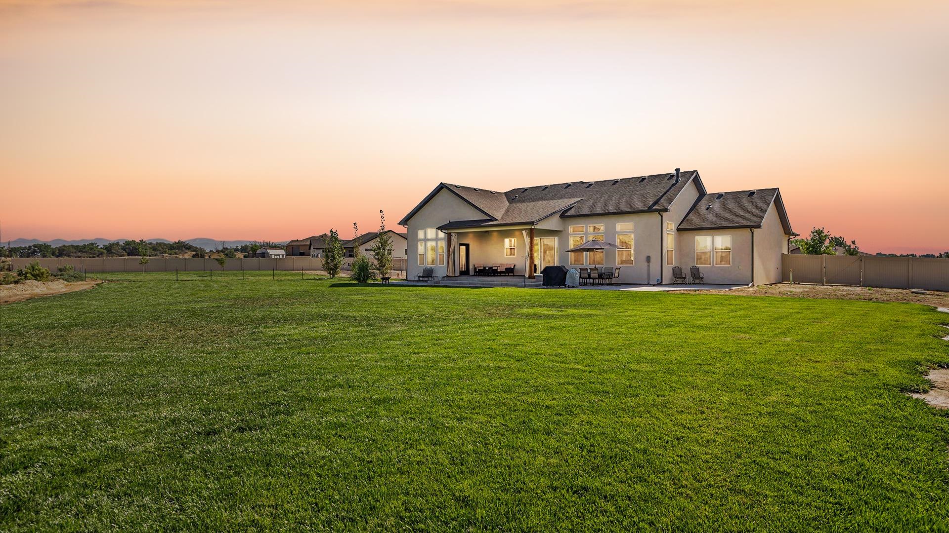 1730 Stremel Creek Fruita, CO 81521 - Photo 32 of 42 a front view of house with garden