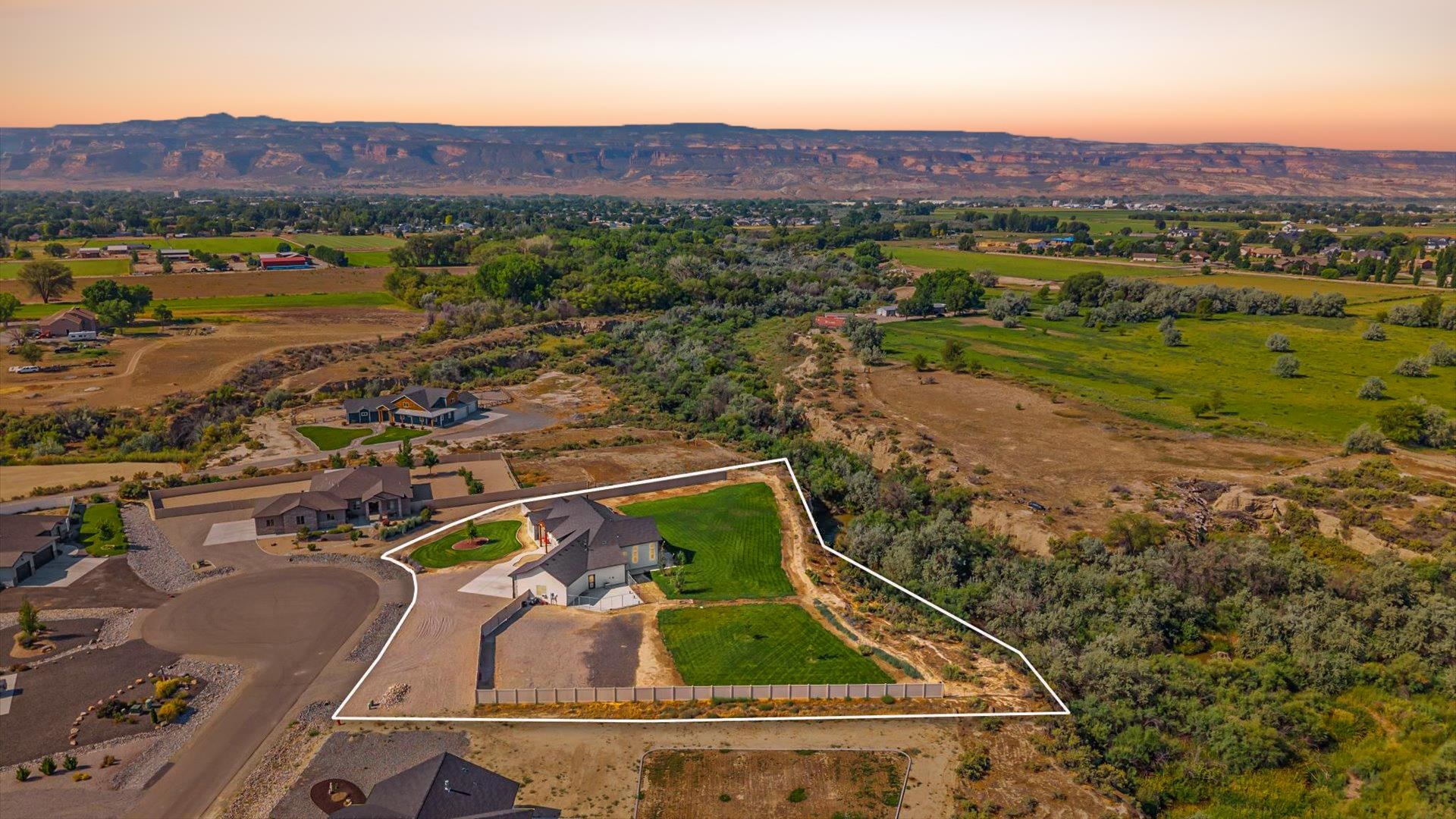 1730 Stremel Creek Fruita, CO 81521 - Photo 35 of 42 an aerial view of a house with a garden