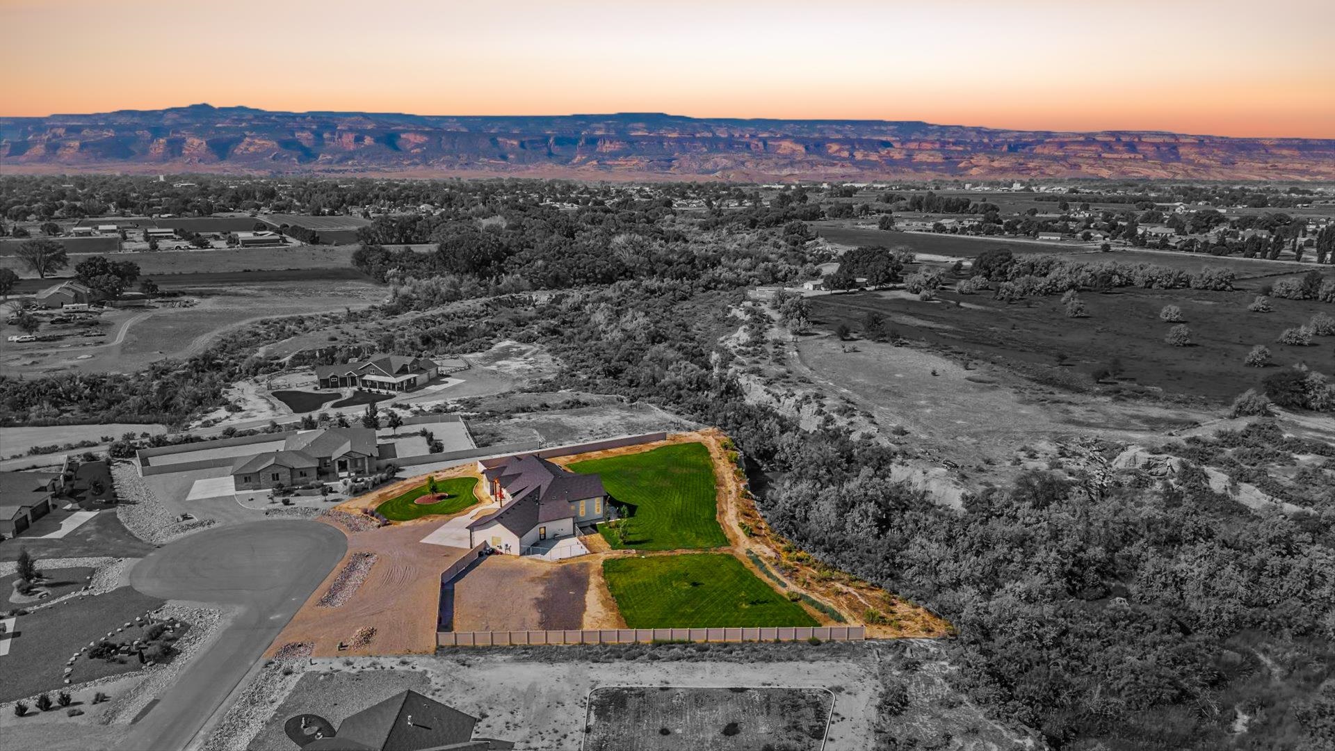 1730 Stremel Creek Fruita, CO 81521 - Photo 37 of 42 an aerial view of a house with a garden
